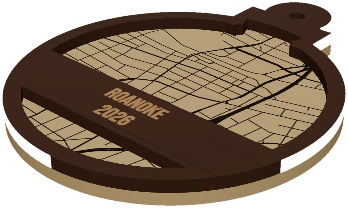 A round map ornament with the name and year on a band